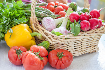 Fresh vegetables in green colander