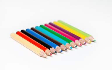 Group of sharp colored pencils with white background