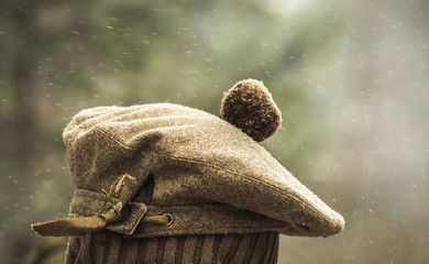 beret with a pompon