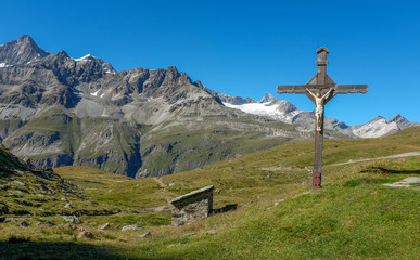 Jezus statue in the Swiss Alps next to Schwarzsee. © Erik_AJV