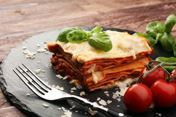 Serving of spicy traditional Italian beef lasagne in a restauran