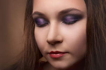 Close-up portrait of girl with professional makeup