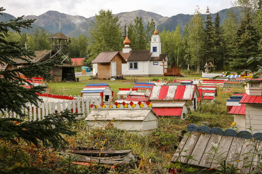 Russian-orthodox Eklutna Cemetery with its colorful graves and spirit houses, Alaska
