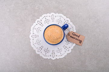 Coffe cup and note good morning. Breakfast concept. Top view