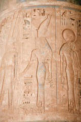 Egyptian carving figure queen and hieroglyphs in column of landmark Temple of Ramses or Ramesses...