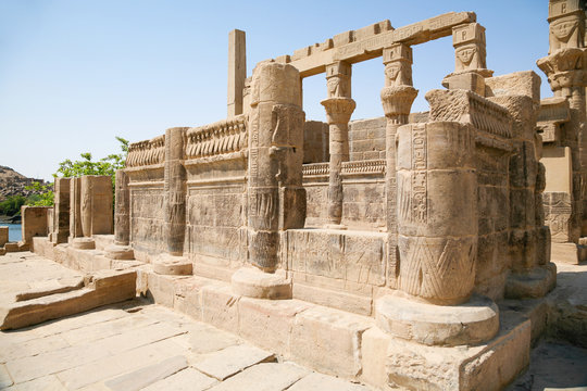 stone carved colonnade in landmark Philae Temple, Egyptian public monument for the goddess Isis, declared World Heritage Unesco, in Egypt, Africa
