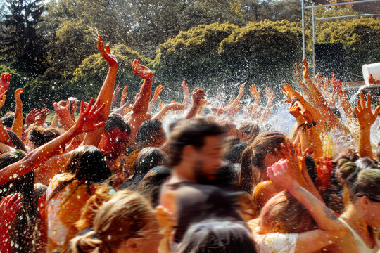 Hands And Happy People Crowd Partying Under Rain At Holi Fest, F