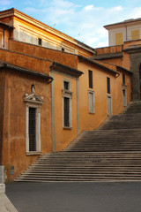Fototapeta na wymiar Rome. Stairs and terracota walls