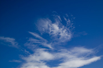Naklejka na ściany i meble Clouds in a Blue Sky