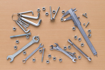 Set of tools on wooden background