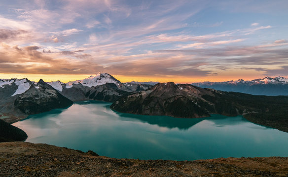 Sunset, lake and capped mountains, Garibaldi Provincial Park, British Columbia, Canada 
