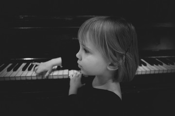 little girl at the piano 