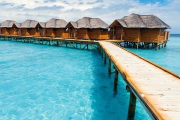 Water bungalows resort at islands. Indian Ocean, Maldives