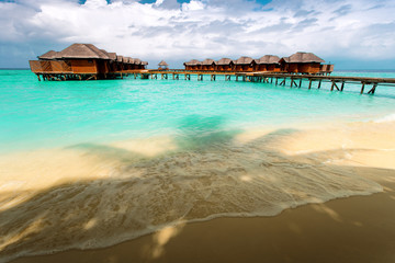 Water bungalows resort at islands. Indian Ocean, Maldives
