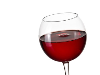 Glass with red wine, close up