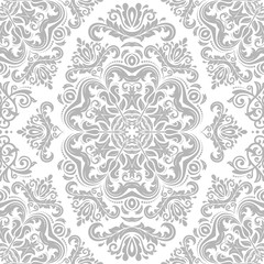 Elegant classic pattern. Seamless abstract background with repeating elements. Light silver pattern