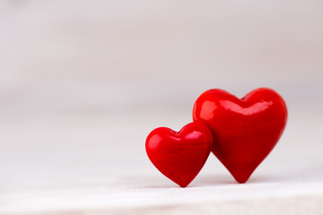 Fototapeta premium Red hearts the bokeh background. Valentine Day background.
