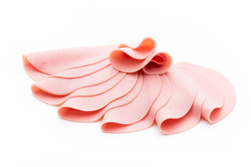 Sliced boiled ham sausage isolated on white background, top view © gitusik