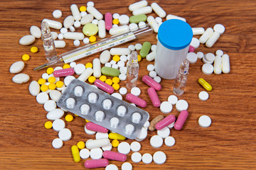 Treatment of diseases with modern methods. Homeopathic and chemicals. Various kinds of drugs in female hands.