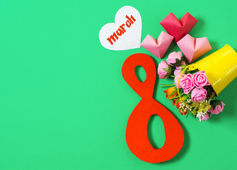 figure 8 and bouquet of flowers in a bucket. International Women's Day. March 8, Happy Women's Day...