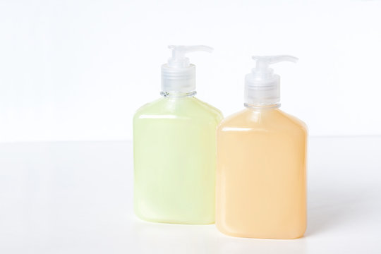 Herbal And Vanilla Extract Liquid Cream Soap. Cosmetics Bottles Mock Ups With Body Lotion Or Shampoo