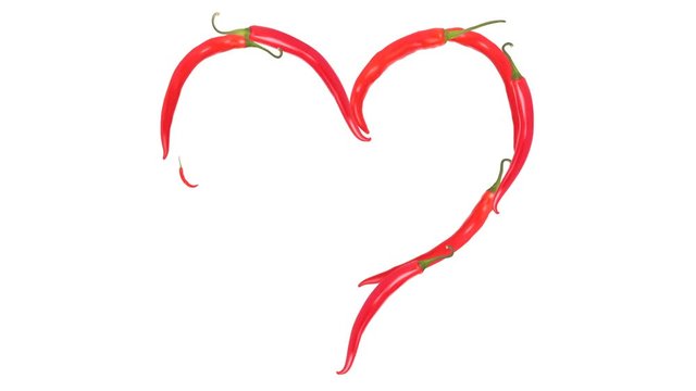 Valentine card red pepper pod laid out in the shape of heart. isolated on white background, Illustration, Full HD video