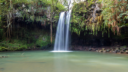 twin falls is a beautiful waterfall in a lush tropical setting on the road to Hana, Maui, Hawaii