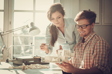 Obraz premium Confident team of engineers working together in a architect studio.