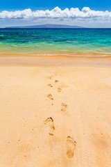 Footprints in the sand at Makena beach, Maui