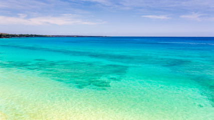 Fototapeta na wymiar snorkelling in the blue water of Makena on the tropical island of maui, hawaii