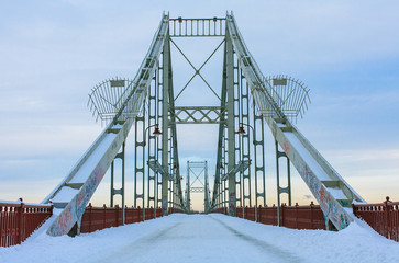 Front view of a bridge at sunset