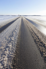 traces of the car in the snow