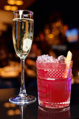 a lot of glasses of champagne on a table in a restaurant