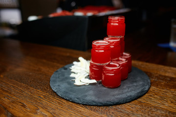 red shots on the bar in the restaurant
