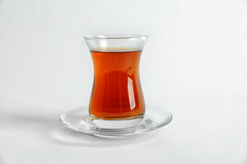 Turkish tea in traditional glass isolated on white