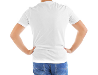 Obraz premium Handsome young man in blank t-shirt on white background, close up