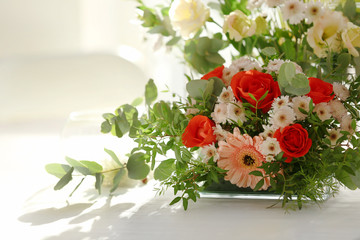 Flower arrangement on a white table