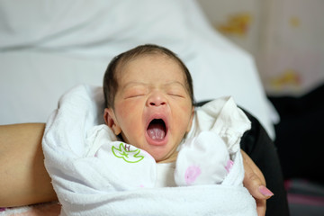 Portrait of a newborn baby close-up. Cute Baby