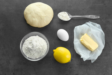 Ingredients for dough on kitchen table
