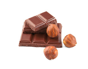 Chocolate pieces with nuts on white background