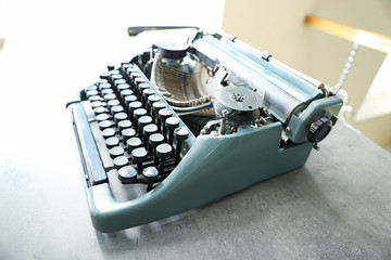 Old typewriter on the table, closeup