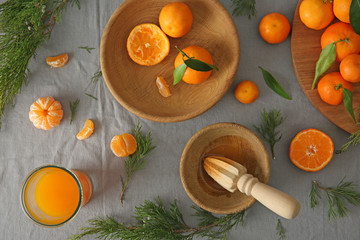 Juicy tangerines on grey background