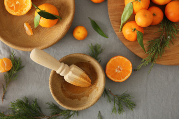 Juicy tangerines on grey background