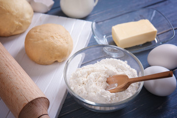 Ingredients for making pie on kitchen table