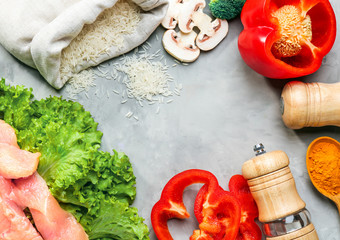 Rice and other products on color background