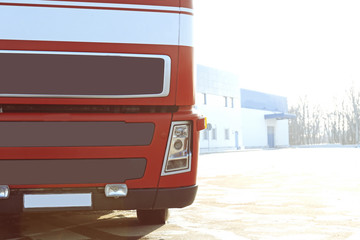 Naklejka premium Front view of big truck outdoors on parking lot