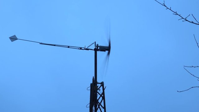 Wind Turbine, Green Energy on Blue. 4K UltraHD video.