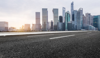 Fototapeta na wymiar urban traffic road with cityscape in background in Shanghai,China.