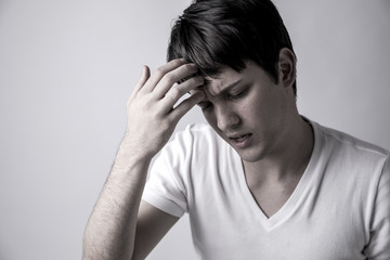 young man have a headache