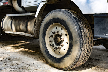 Tire on a big muddy truck